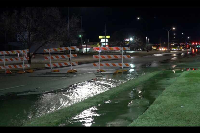 Temperatures were in the 20s when a water main broke on Lancaster Avenue in Fort Worth early...