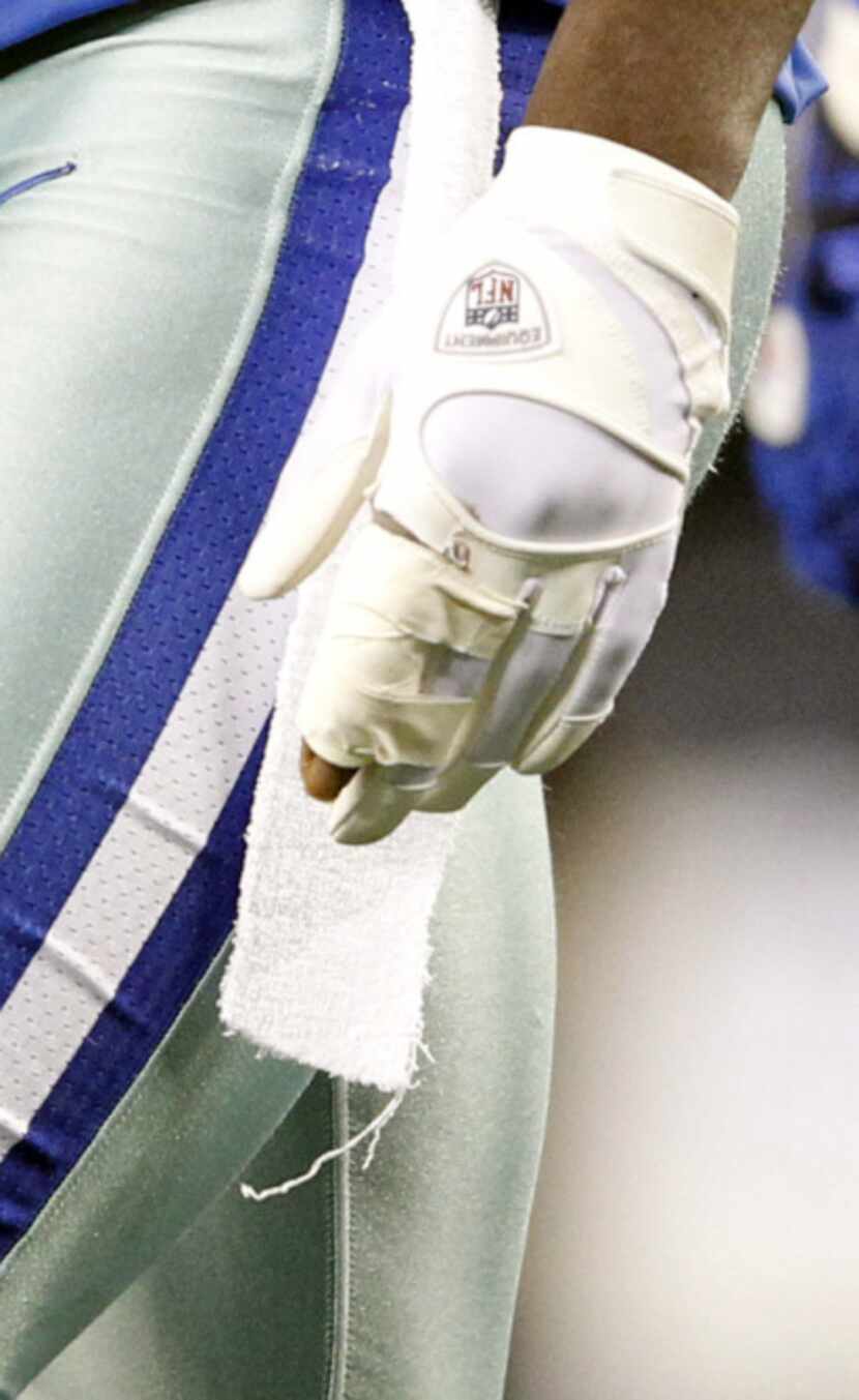 Detail of the hand of Dallas Cowboys wide receiver Dez Bryant (88) during a break in play in...