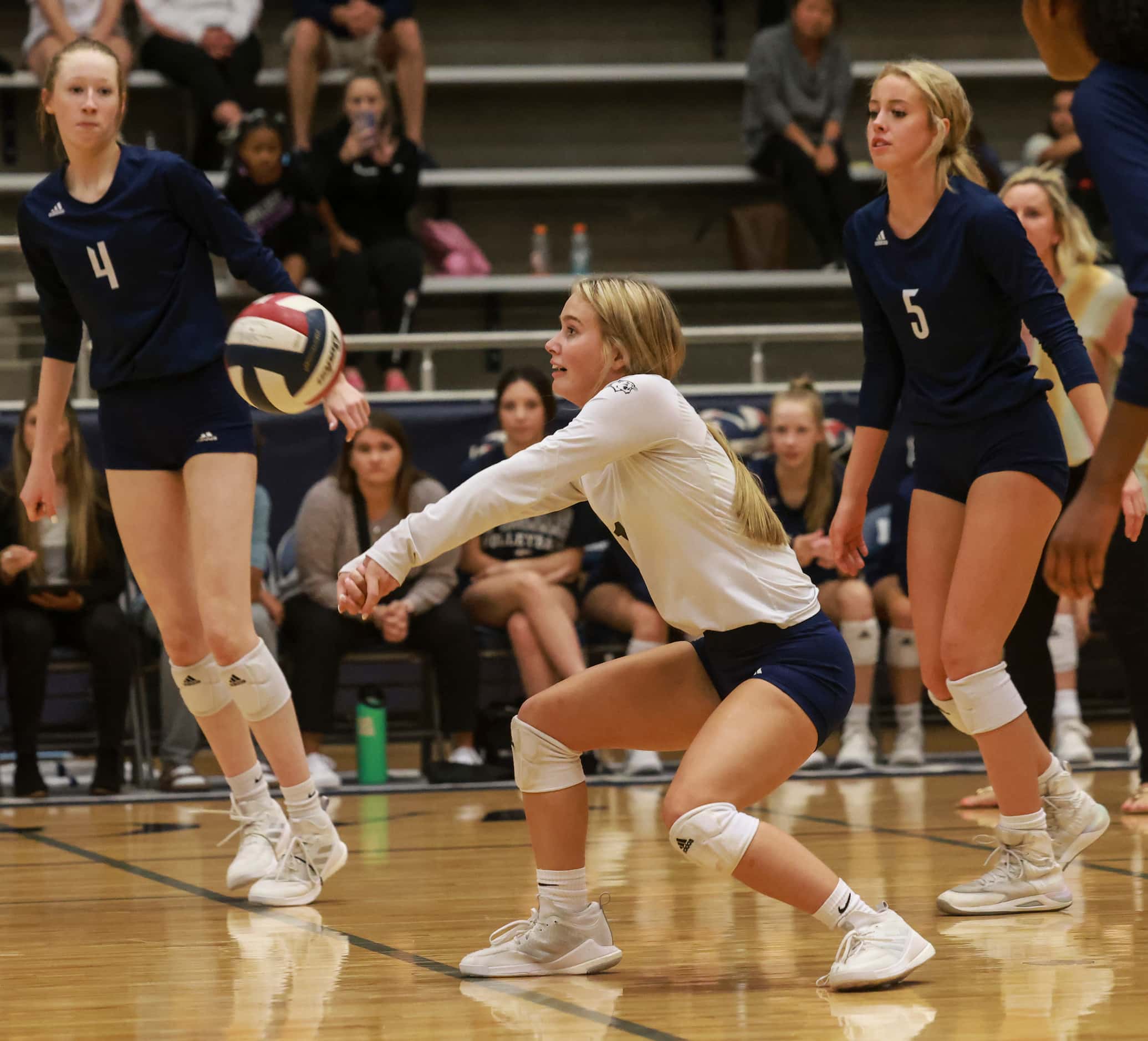 Flower Mound High School Emerson Dement (1) bumps the ball during the volleyball game...