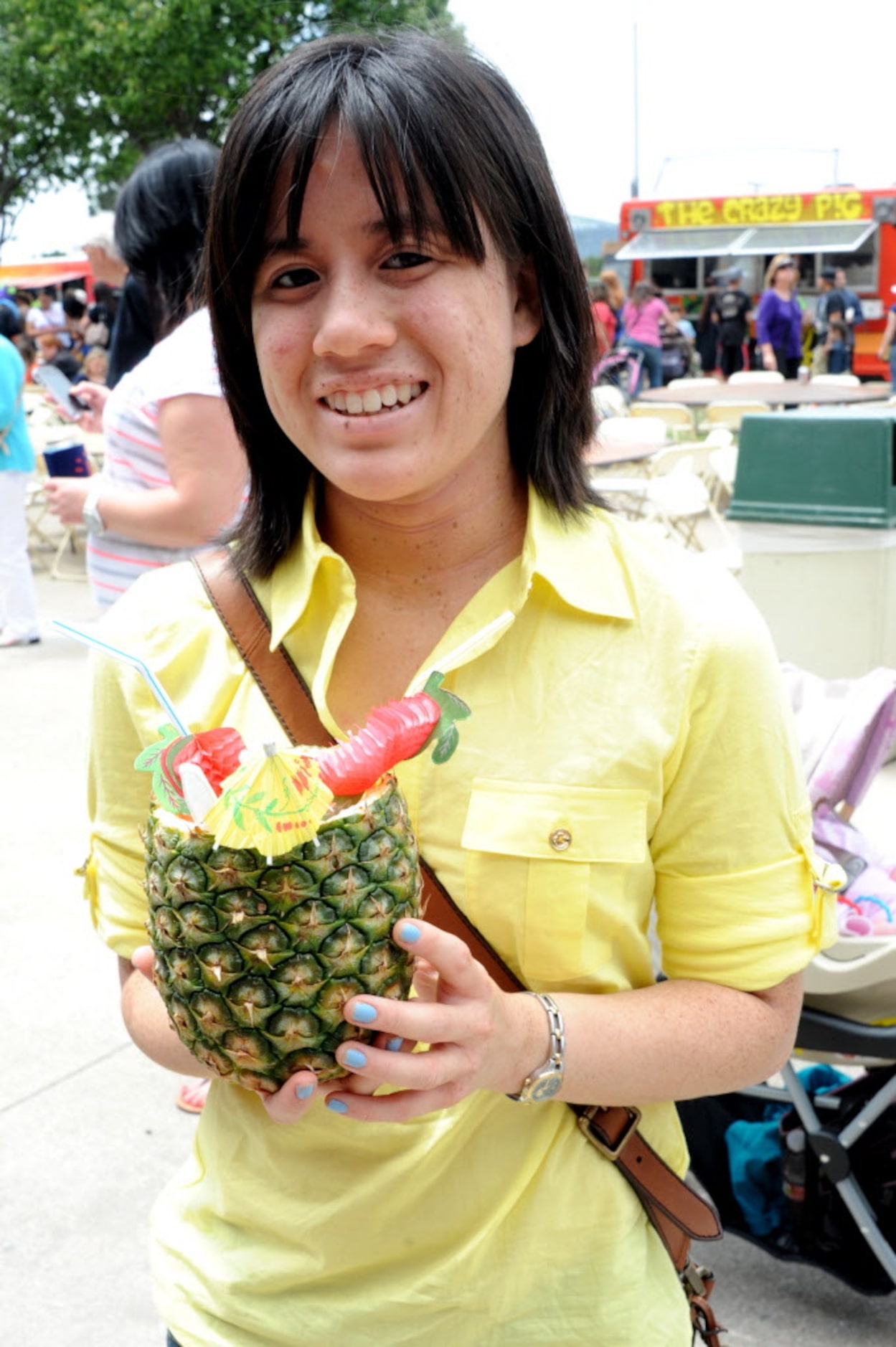 Danielle Delacruz from Denton enjoys her Pineapple Explosion from the Dolly Trolly at the...