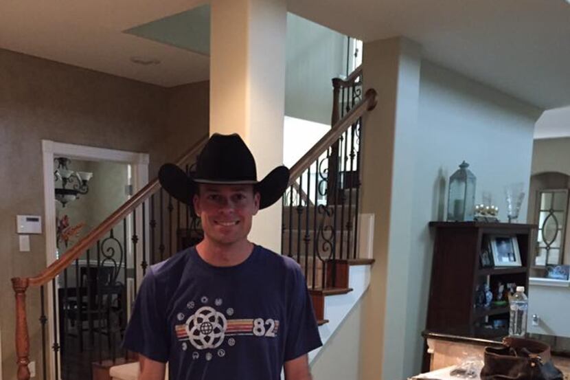 Andrew Cook, Sunday's Cowtown Marathon champion, sporting the winner's cowboy hat.
