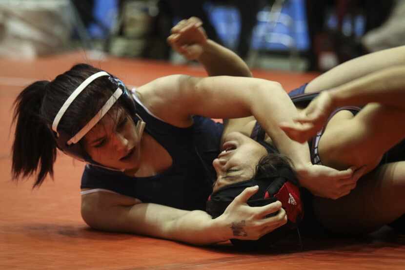 Allen High School freshman wrestler Alex Liles (left), pictured here during the 2015 state...