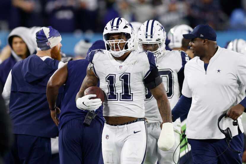 Dallas Cowboys linebacker Micah Parsons (11) walks to the bench after recovering a fumble...