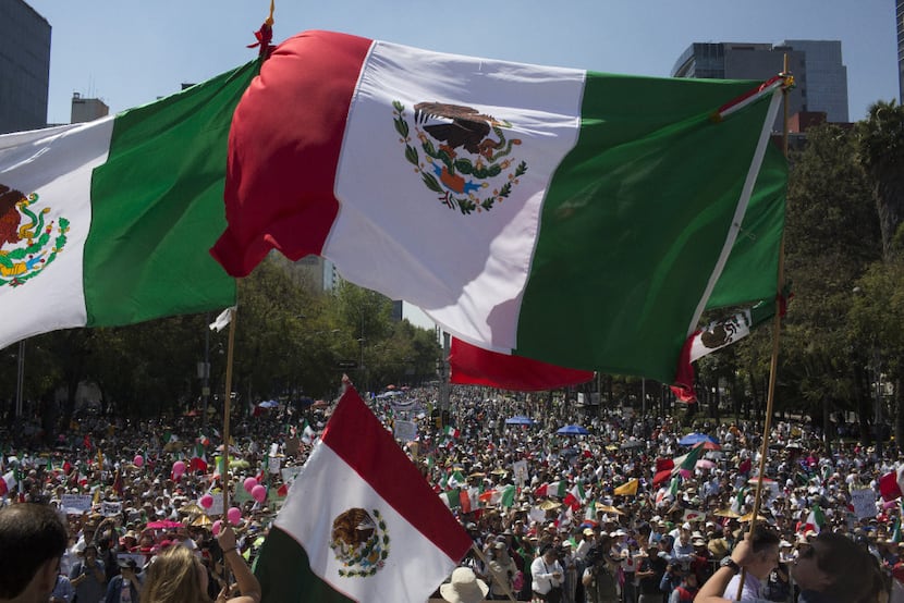 Demonstrators marched to the Plaza Angel Independencia on Sunday in Mexico City, protesting...