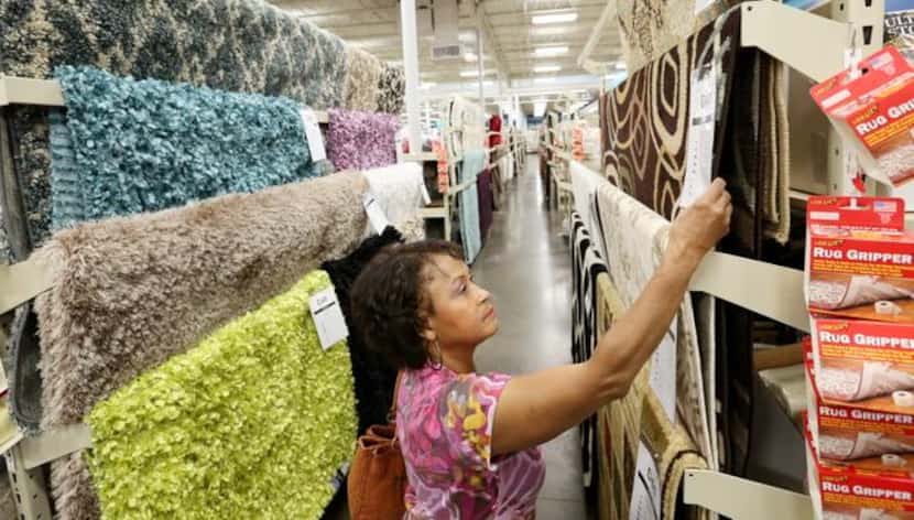
Martha Smith of Carrollton shops for rugs at the At Home store in Lewisville. At Home...