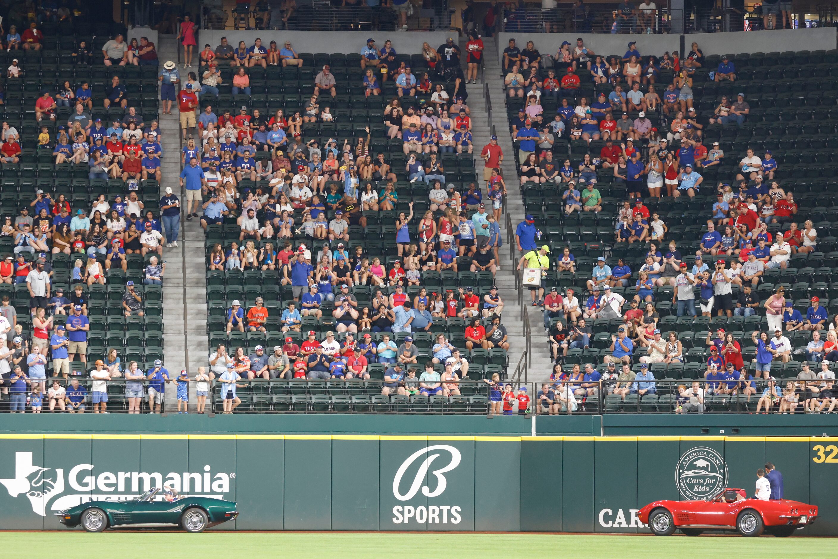 Texas Rangers media VP John Blake, left, and Former Texas Ranger Ian Kinsler exits the...