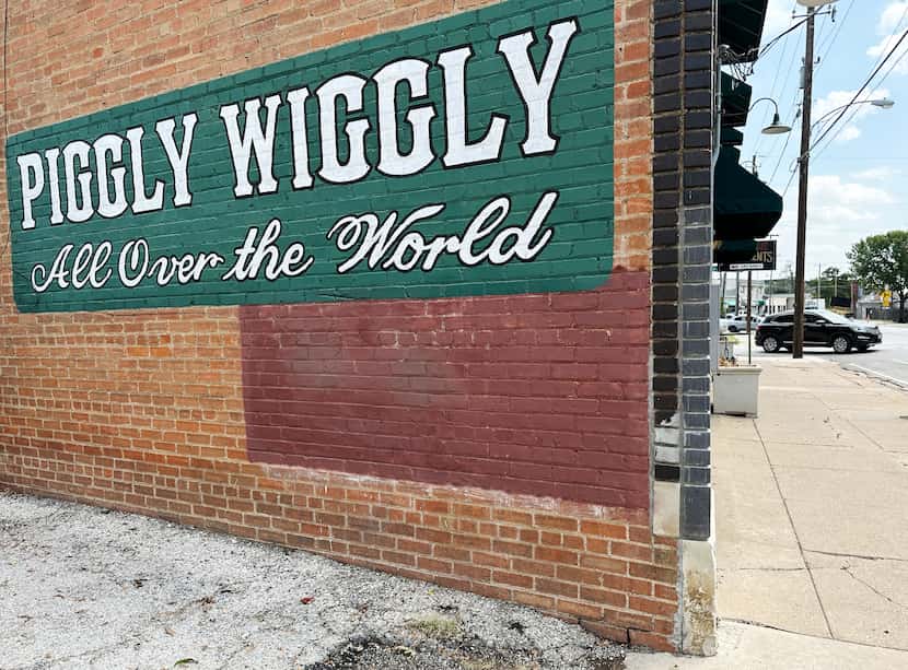 Piggly Wiggly remains on a building at the intersection of South Harwood and Beaumont...