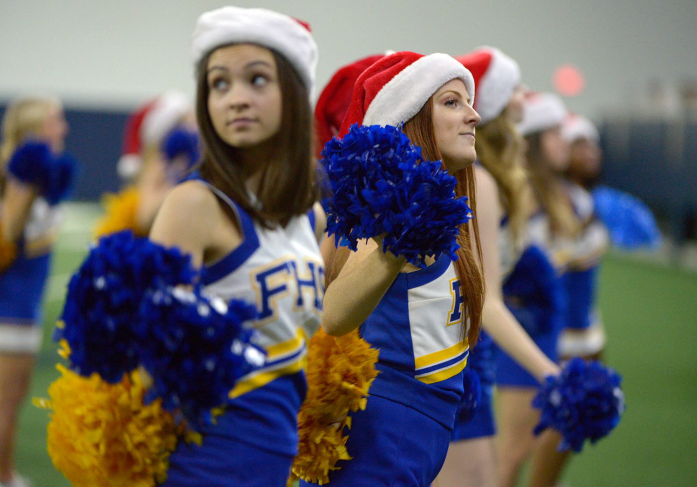 Frisco cheerleaders perform in the second half during a Class 5A Division II Region  II...