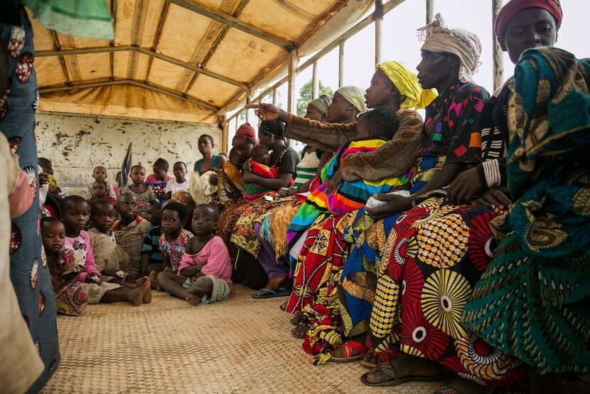 Congolese who crossed the border from the Democratic Republic of Congo wait to be registered...