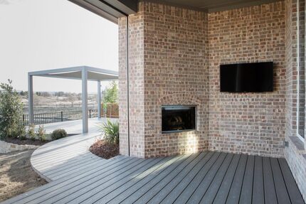 The patio has a movie screen, grilling area and gaming area.