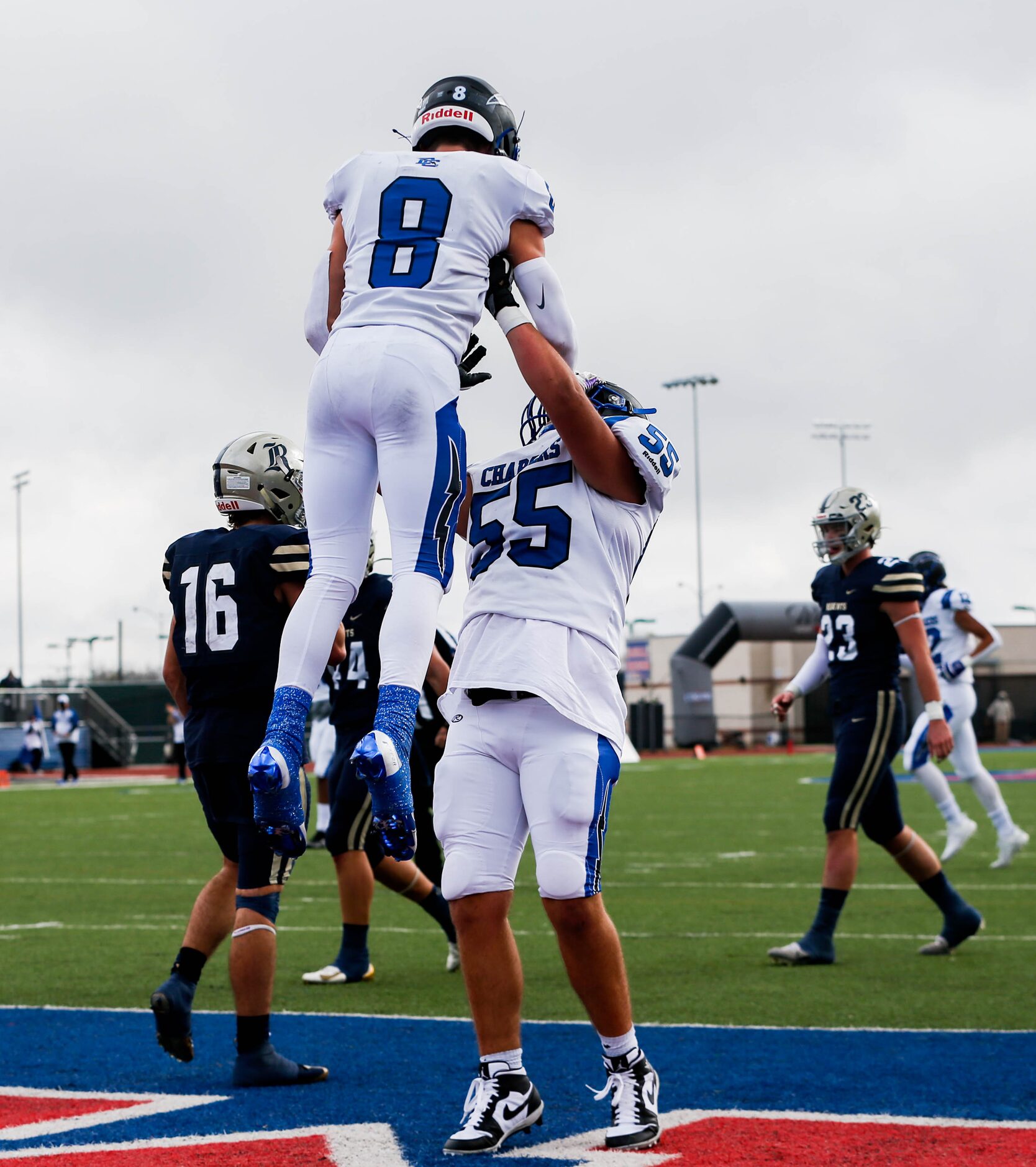 Dallas Christian's Parker Robertson (8) celebrates his touchdown against Austin Regents with...