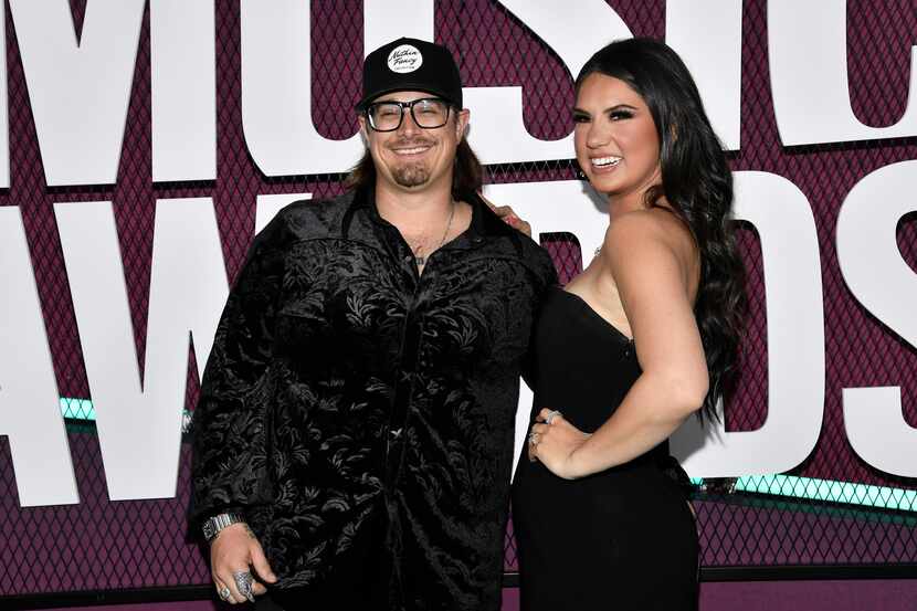 HARDY, left, and Caleigh Ryan arrive at the CMT Music Awards on Sunday, April 2, 2023. HARDY...