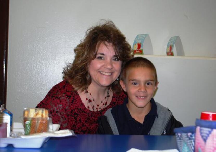 
Principal Hill stopped by the cafeteria to say hello to her son, Jackson. Both of Hill’s...