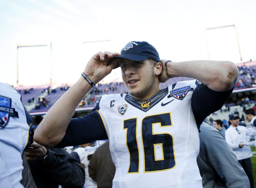 California Golden Bears quarterback Jared Goff (16) puts on a Lockheed Martin Armed Forces...