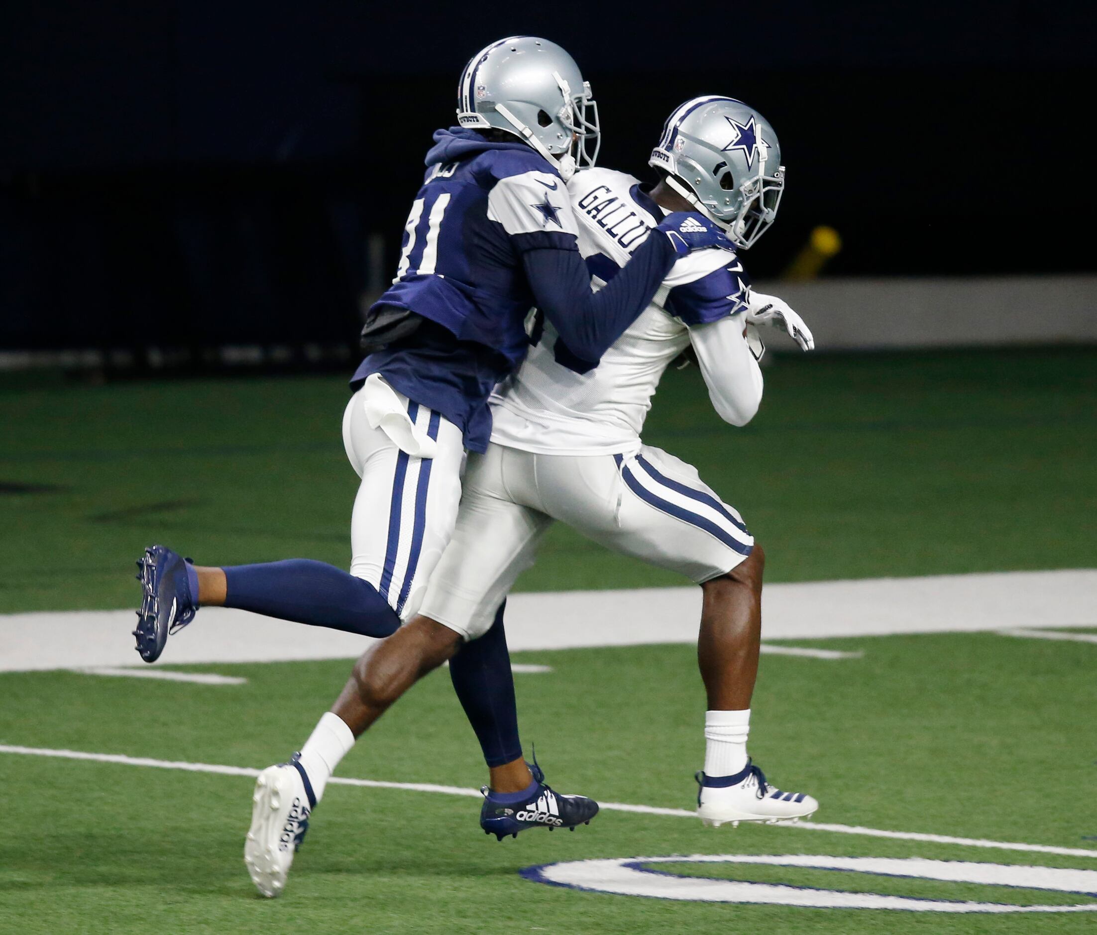 Dallas Cowboys wide receiver Michael Gallup (13) is tackled by Dallas Cowboys cornerback...