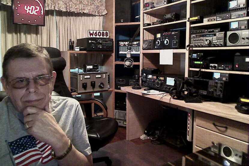 This publicity image released by SiriusXM shows Art Bell his home studio in Pahrump, Nev.