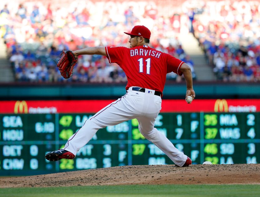 FILE - Texas Rangers starting pitcher Yu Darvish (11) pitches in the third inning against...