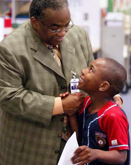 Way back in May 2003 ... Malvern Elementary student Clifton Mack, 7, was congratulated by...