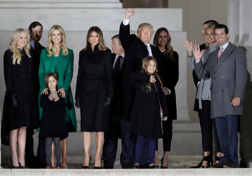 President-elect Donald Trump and his wife Melania Trump stand with family at the conclusion...