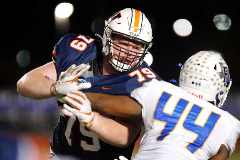 Wakeland High School offensive lineman Connor Stroh (79) blocks Frisco High School defensive...