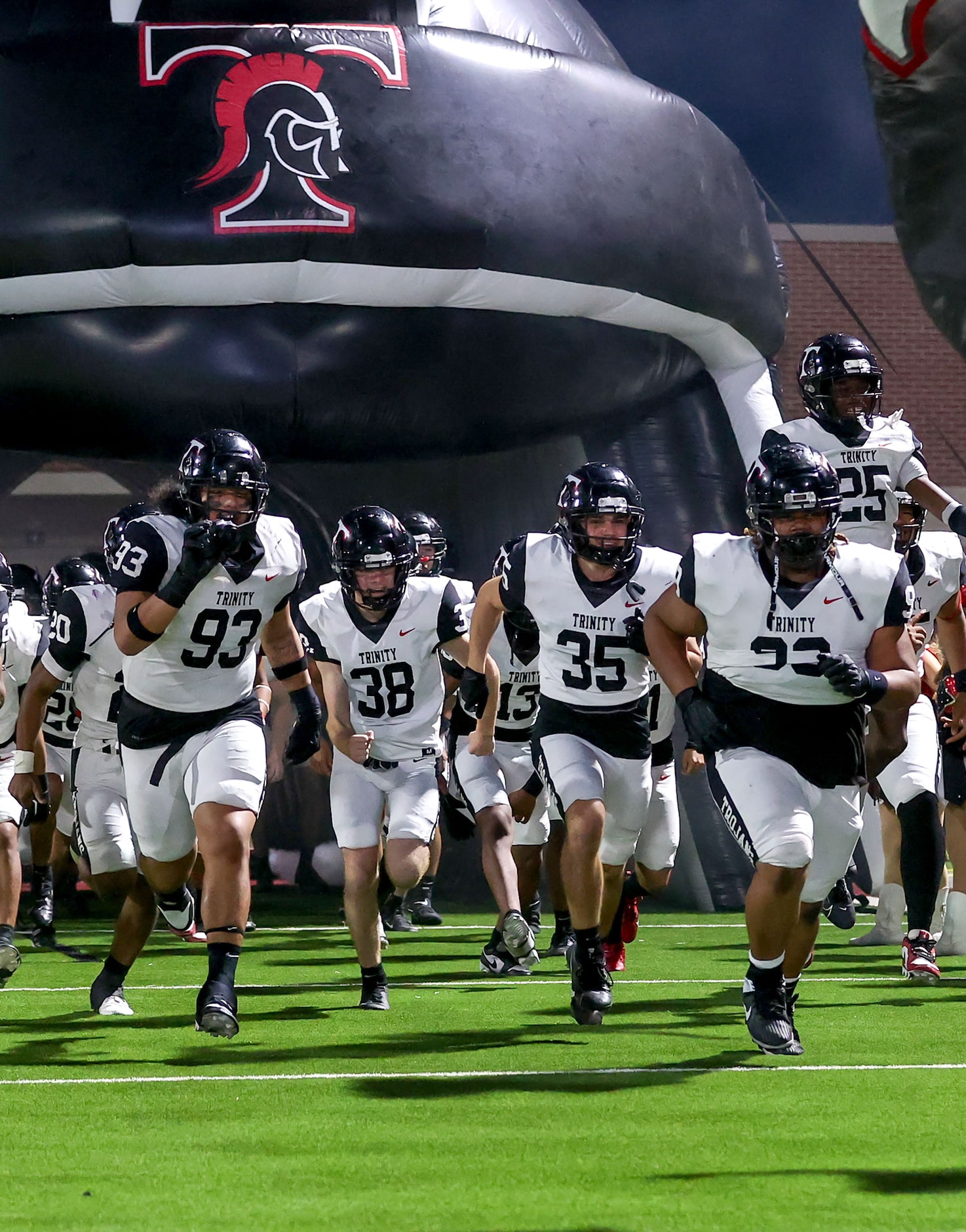 The Trinity Trojans enter the field to face Justin Northwest in a District 4-6A high school...