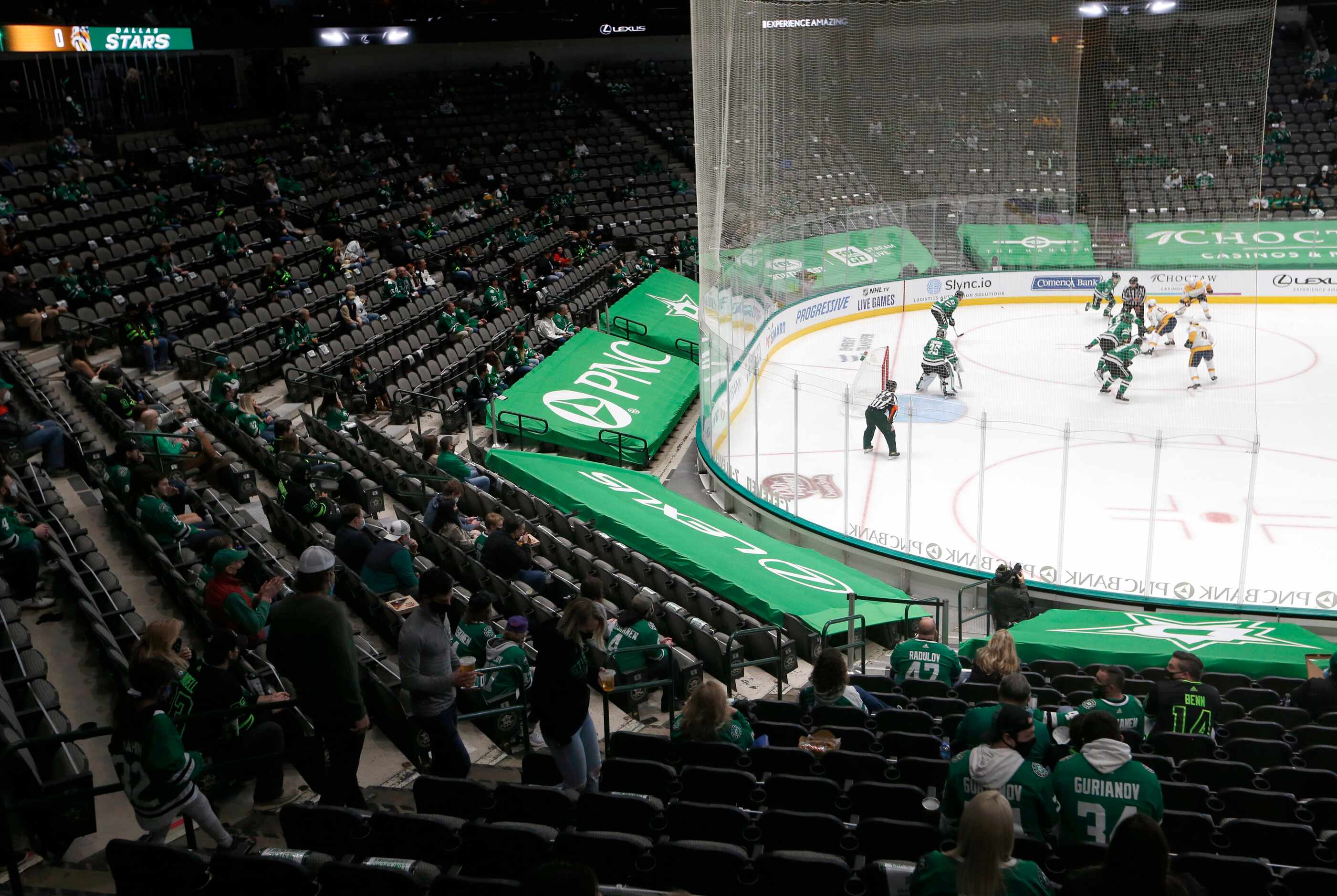 Dallas Stars fans watch as the Dallas Stars play against the Nashville Predators during the...