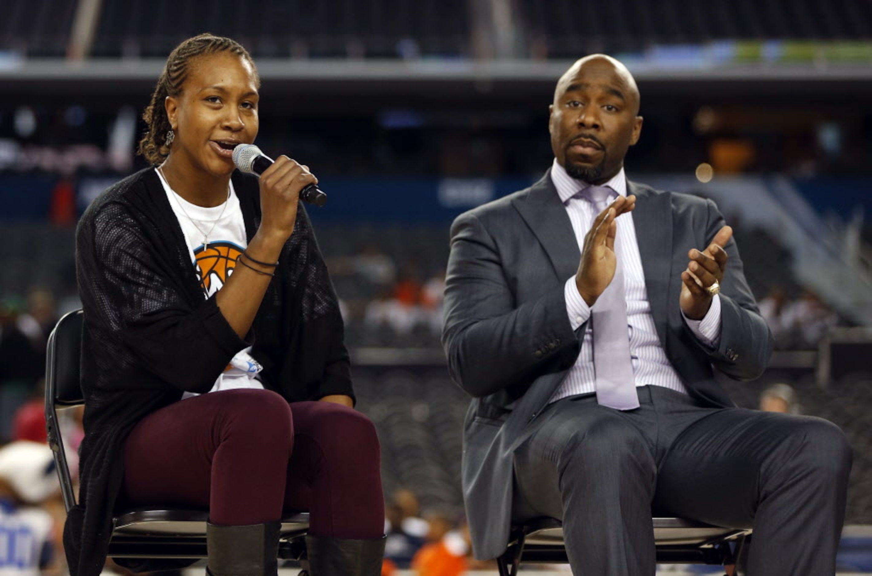 Tamika Catchings talks next to Mateen Cleaves during the Reese's Final Four Slant...