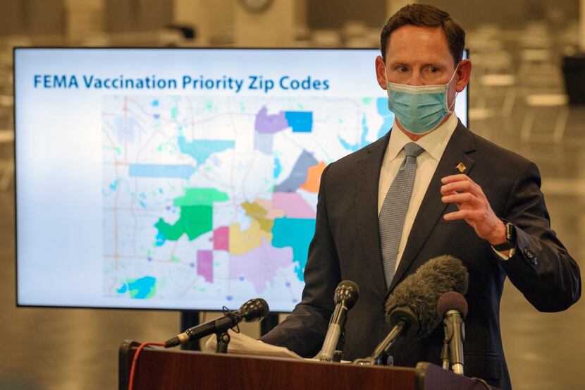 Dallas County Judge Clay Jenkins conducts a press conference about the COVID-19 vaccine...