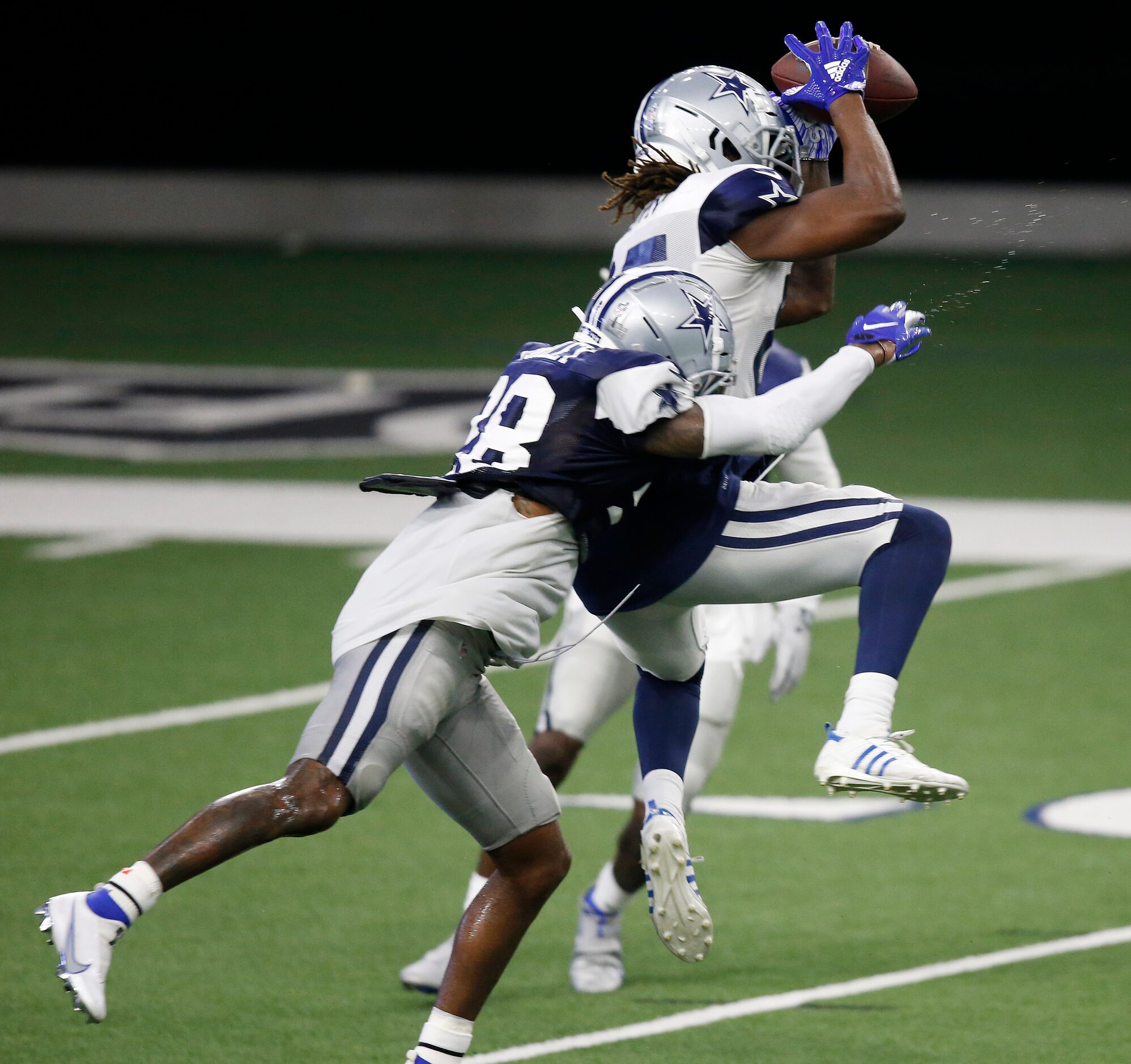 Dallas Cowboys wide receiver Noah Brown (85) catches a pass in front of Dallas Cowboys...