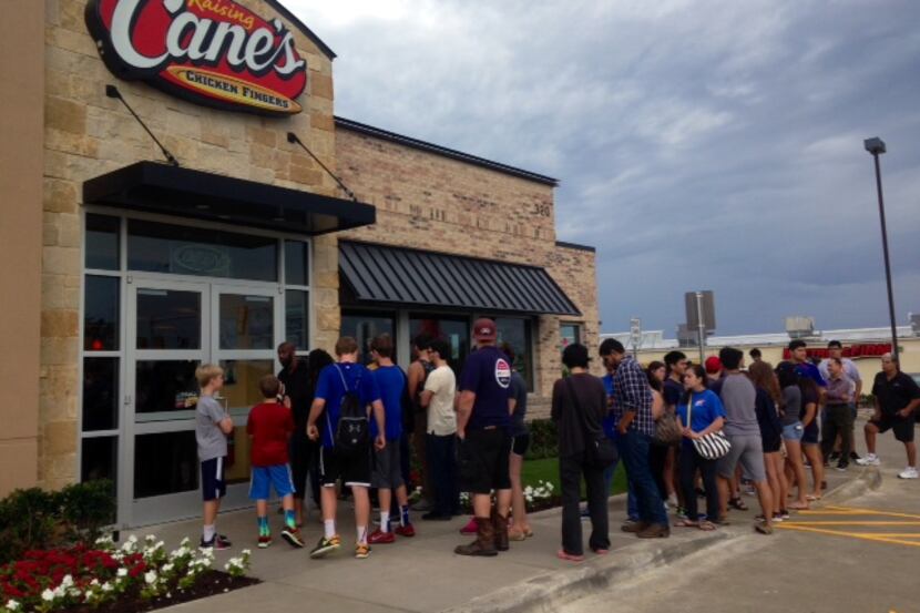In 2014, customers line up outside Raising Cane’s at 320 S. Plano Road in Richardson....