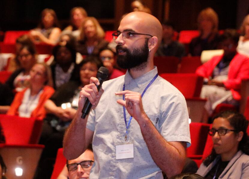 Anthony Castro, a teacher at DISD's Foster Elementary School, asks a question of Gloria...