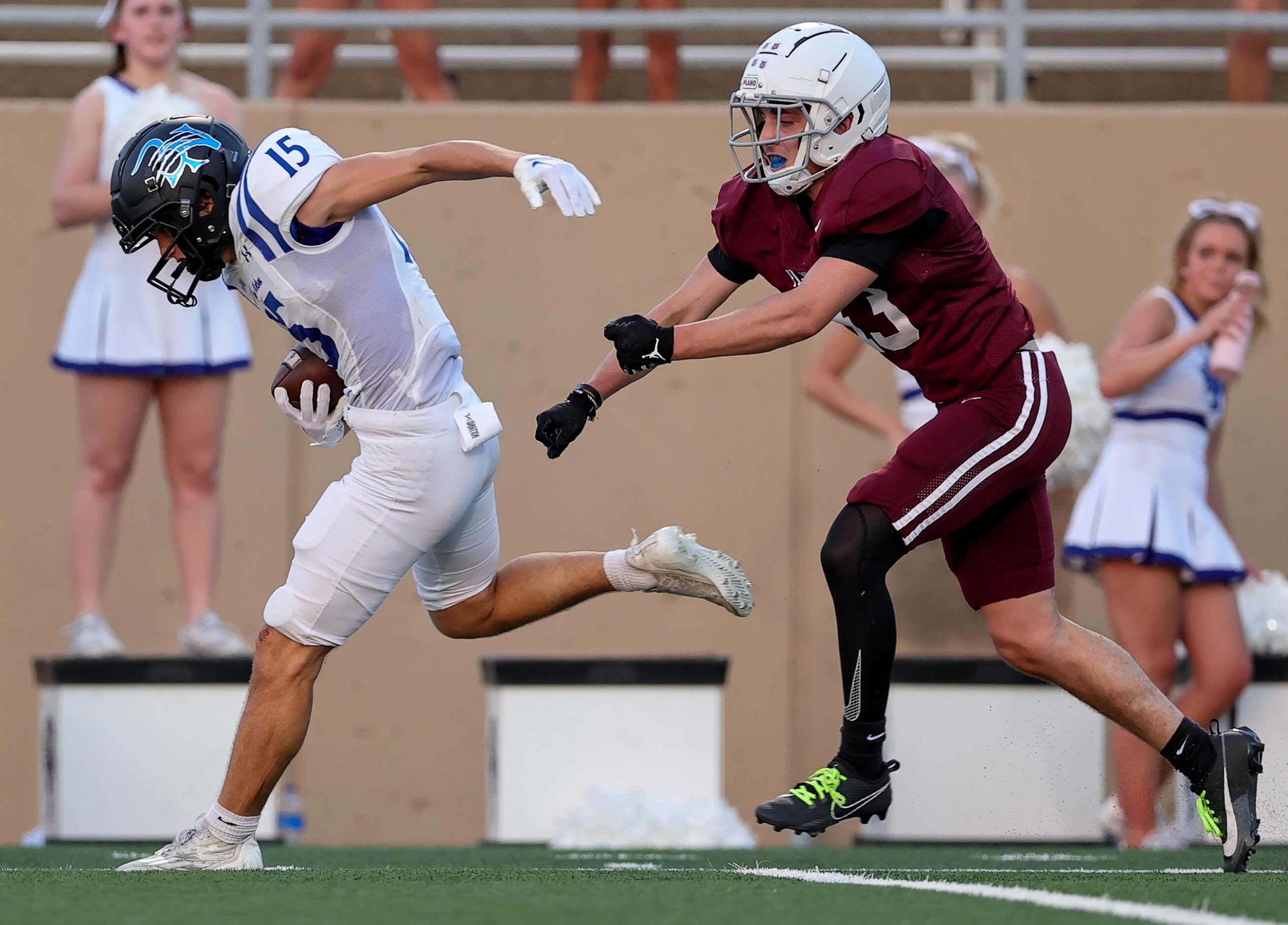 Byron Nelson wide receiver Grant Bizjack (15) comes up with a reception against Plano...