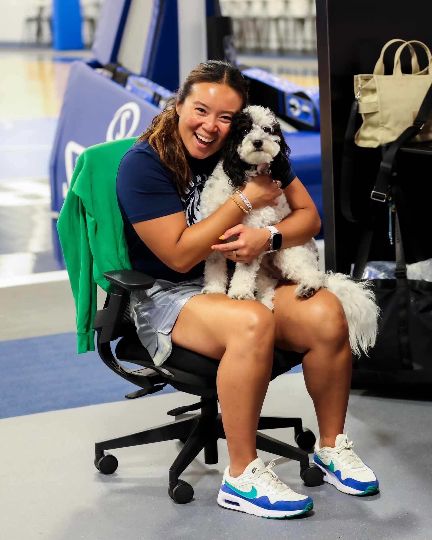 Dallas Mavericks assistant athletic trainer Heather Mau with the team's emotional support...