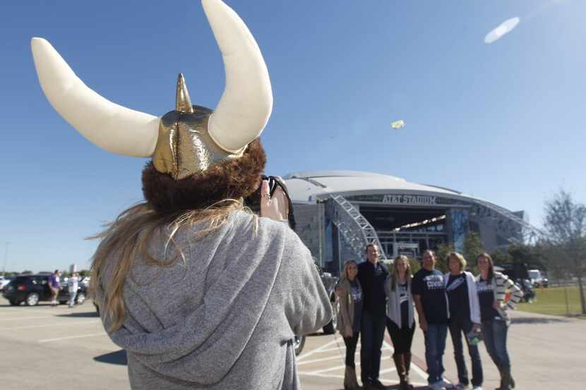 Sydney Bedford of San Antonio takes a group photo prior to the Dallas Cowboys- Minnesota...