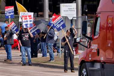 Some of the 420 Molson Coors workers continue to strike outside one of the biggest breweries...