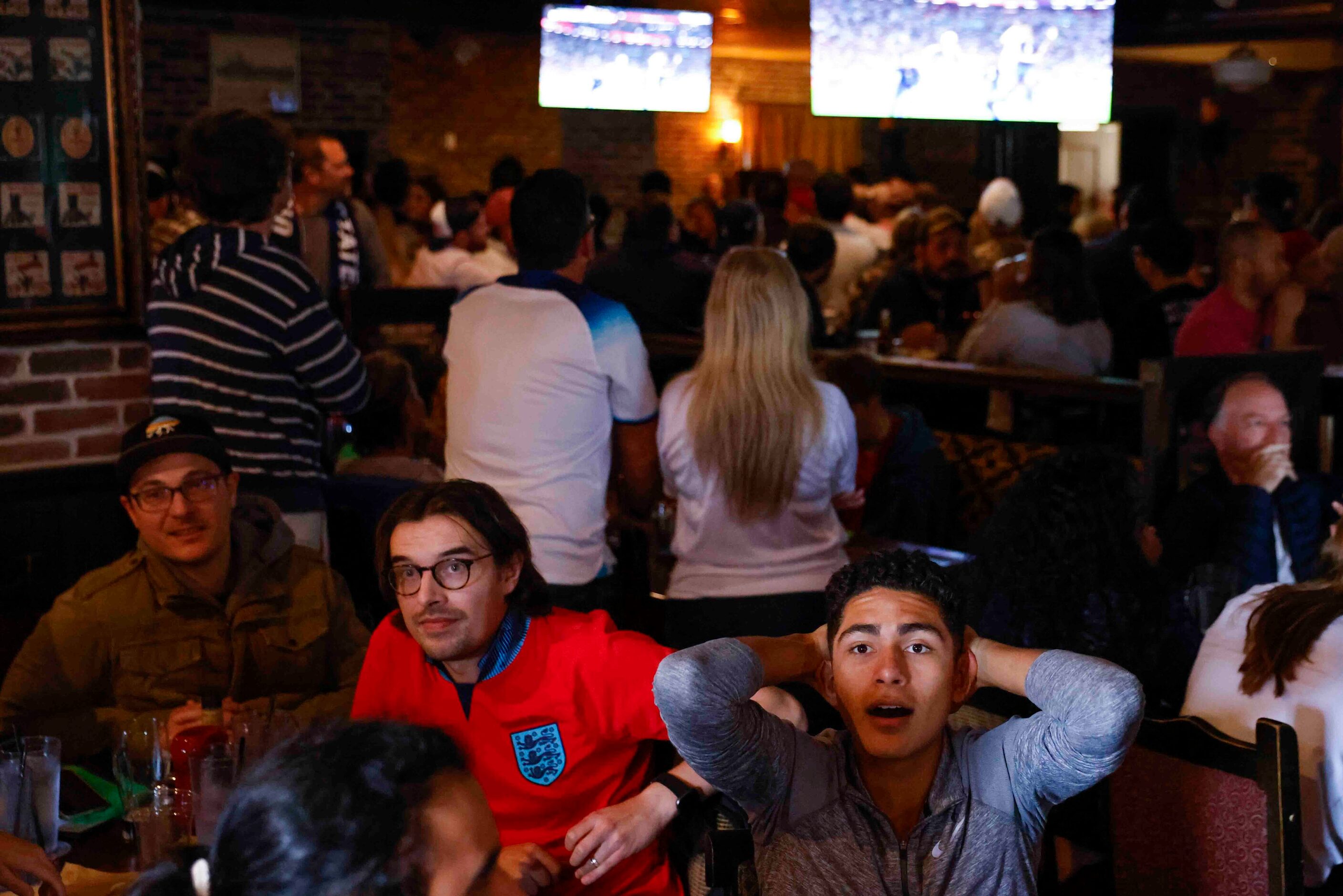 Jesse Martinez, right, of Dallas, reacts during a soccer game between USA and England at a...