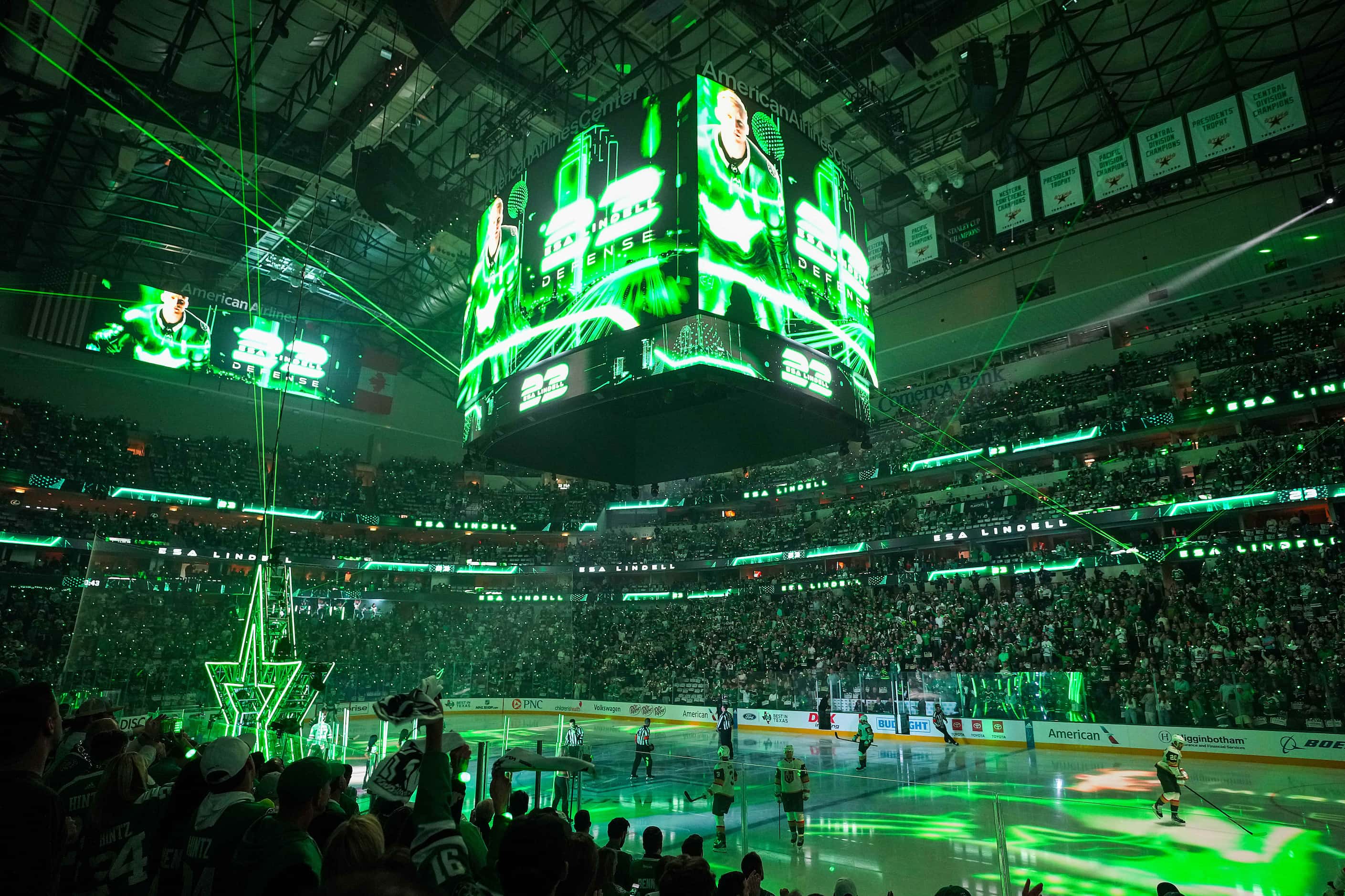 Dallas Stars fans cheer as their team is introduced before Game 5 of an NHL hockey Stanley...