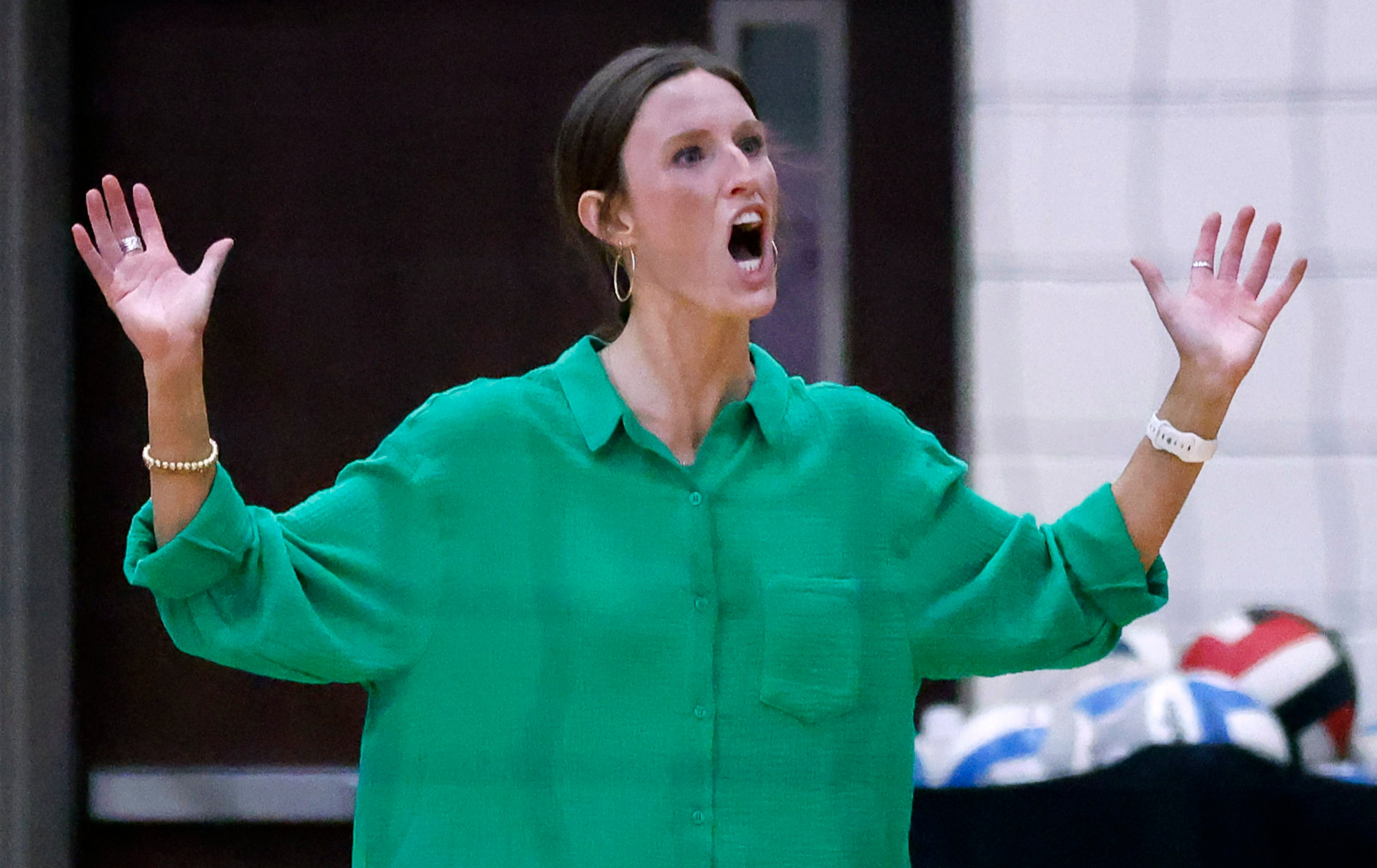 Southlake Carroll head coach Leslie Jackson reacts to an officials call during their...