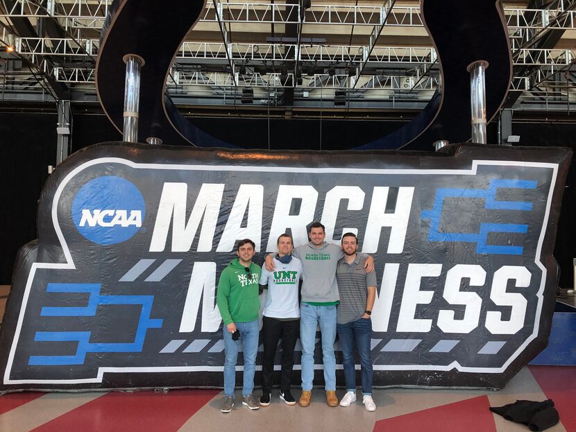 DJ Draper (middle left) stands alongside his friends from North Texas at Lucas Oil Stadium...