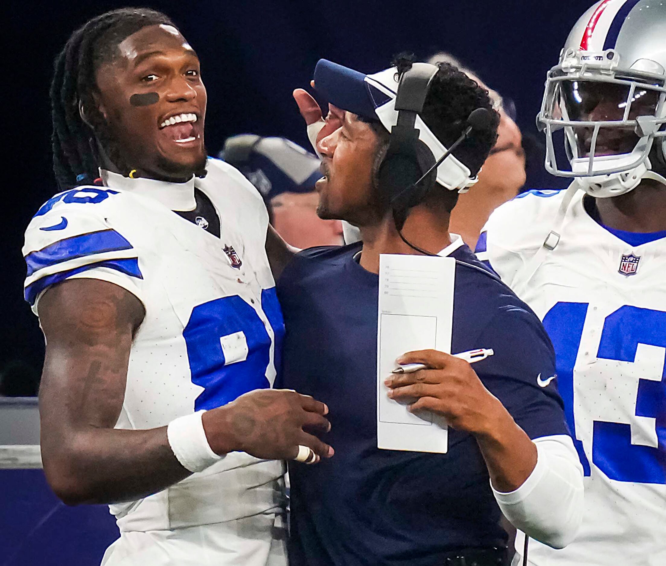 Dallas Cowboys wide receiver CeeDee Lamb (88) celebrates on the sidelines with wide...