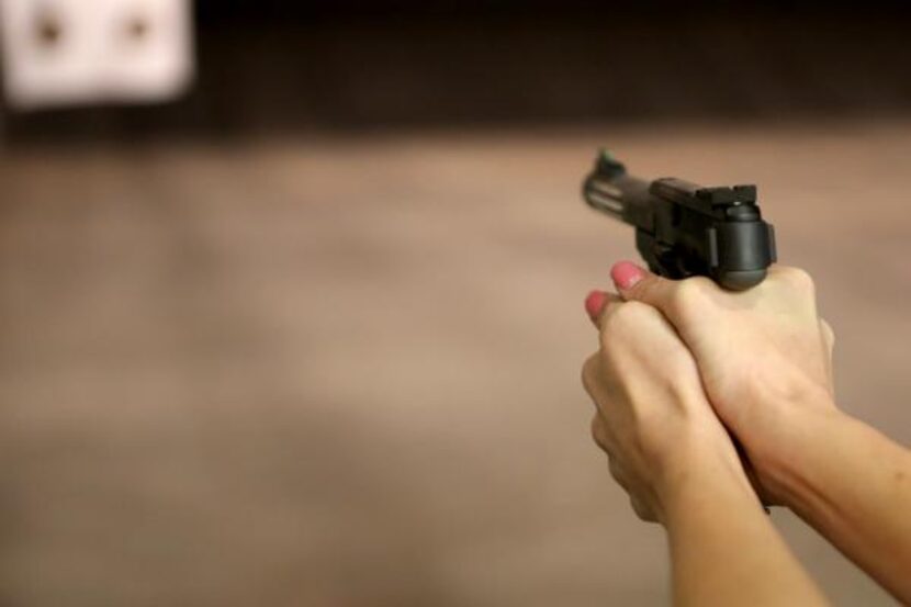 
Sarah Delapaz shoots during Ladies Night at the Frisco Gun Club on February 19, 2014 in...