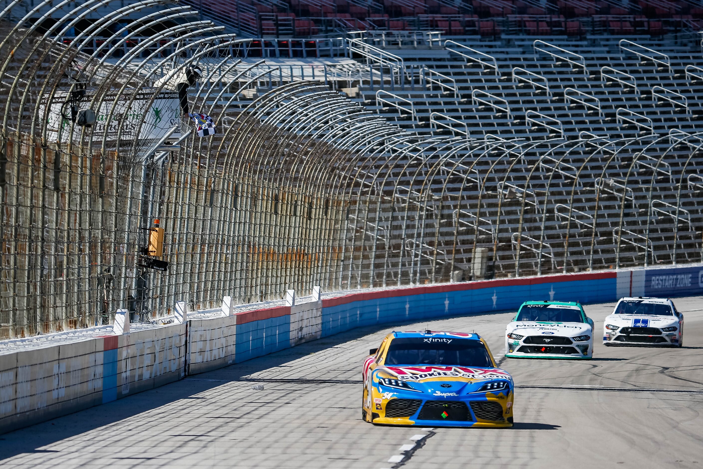 NASCAR Xfinity's Kyle BuschÕs (No. 54) crosses the finish line during the My Bariatric...