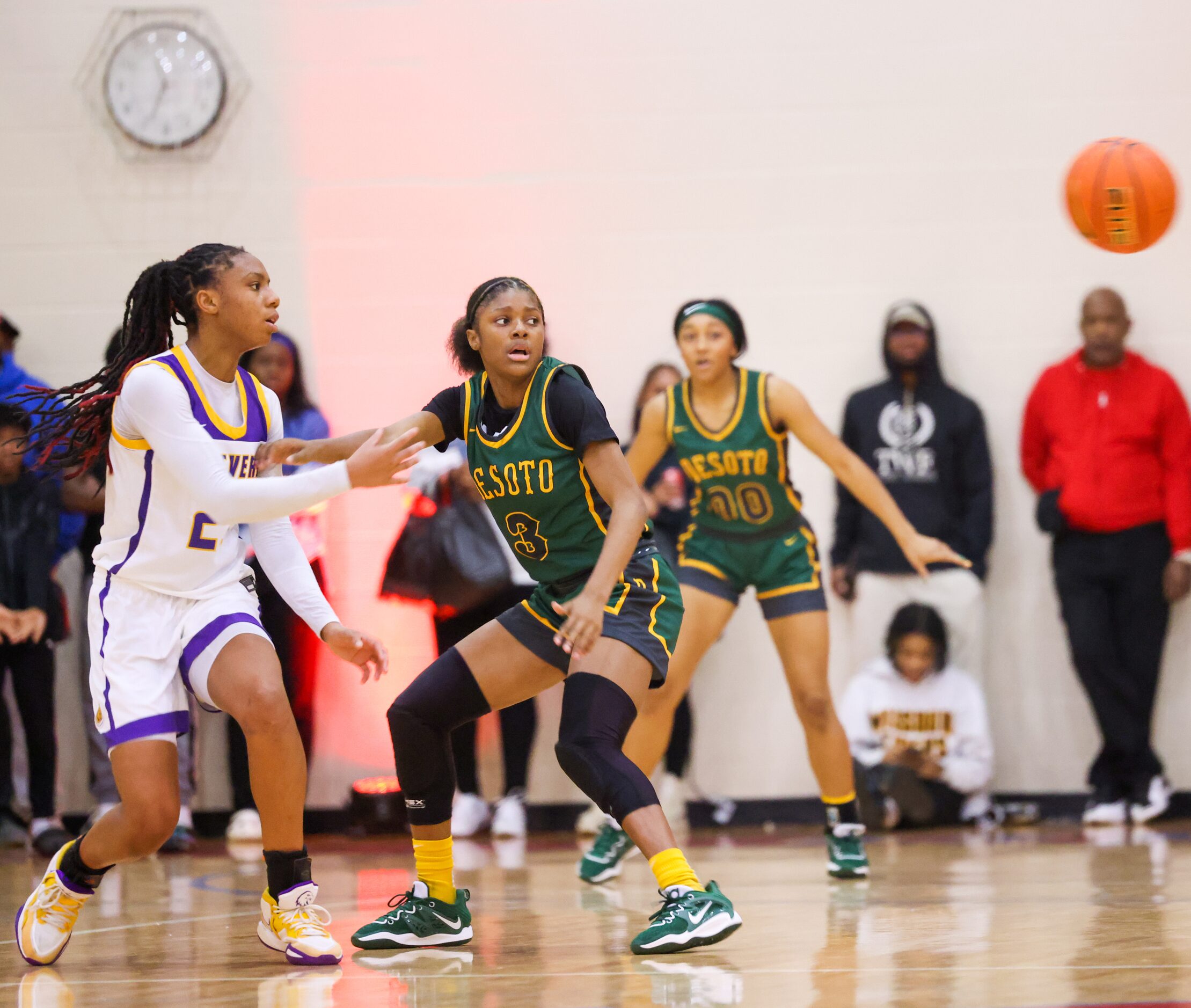 DeSoto point guard Rieyan DeSouze (3) watches the ball move between Montverde Academy...