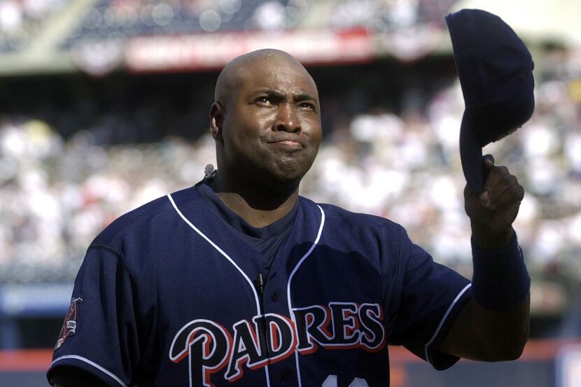 FILE - In this Oct. 7, 2001 file photo, San Diego Padres' Tony Gwynn fights back tears as he...