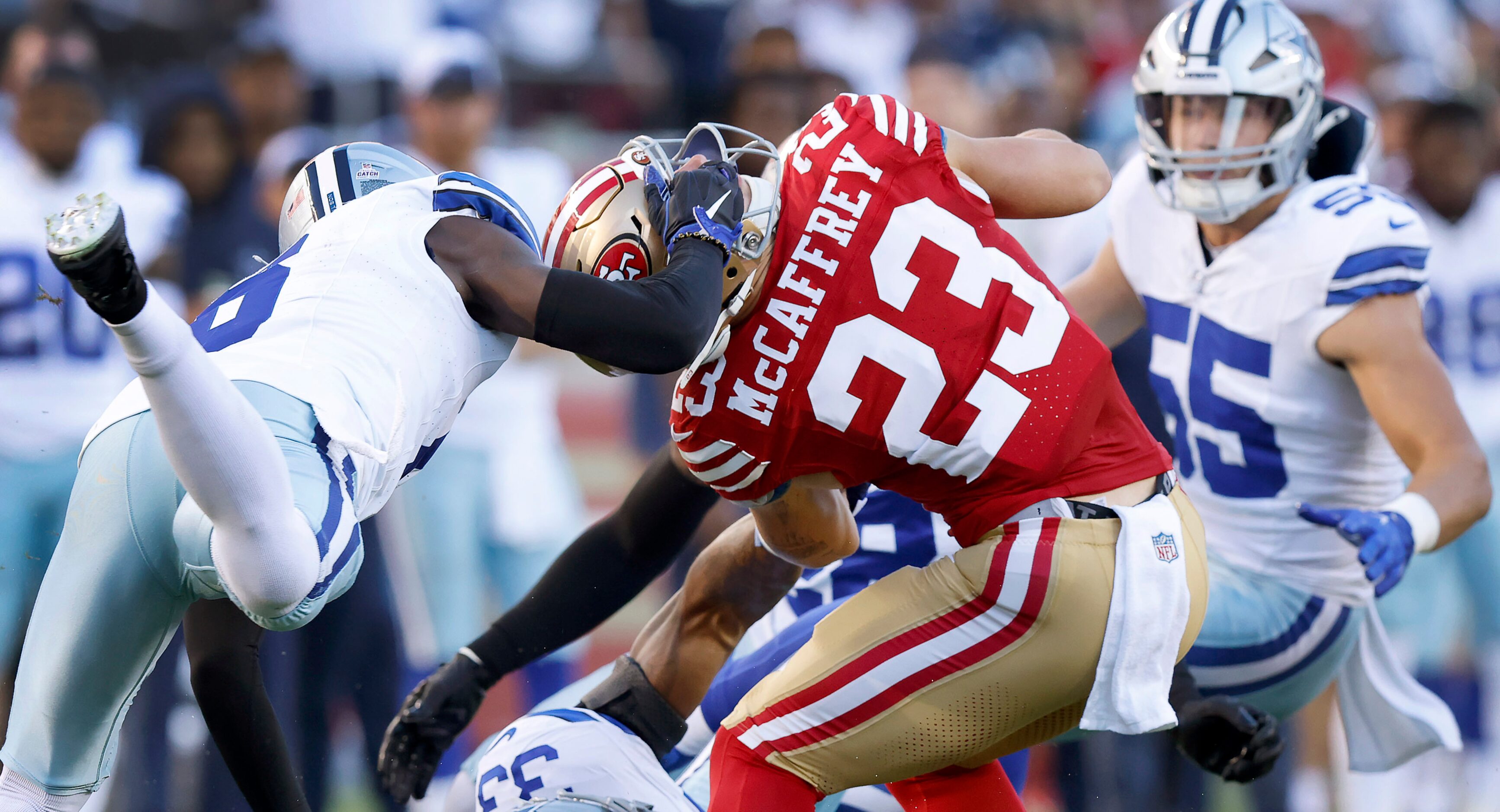 Dallas Cowboys safety Donovan Wilson (6) turns San Francisco 49ers running back Christian...