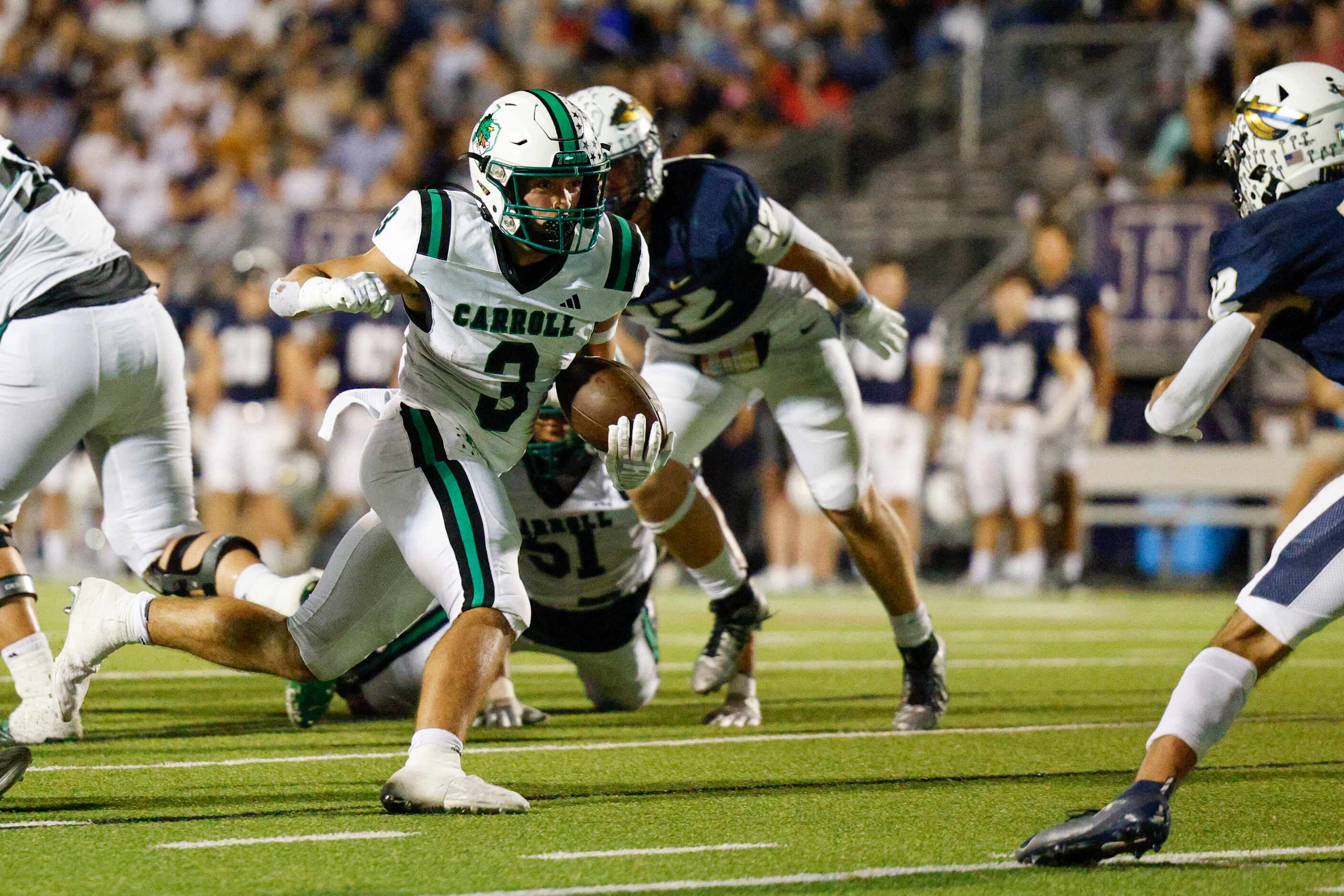 Southlake Carroll running back Davis Penn (3) rushes for at touchdown during the first half...