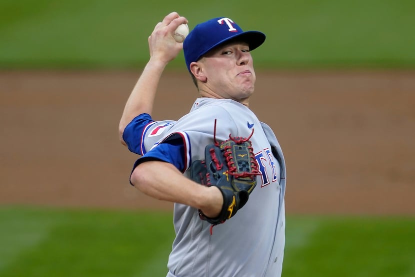 Texas Rangers' Kolby Allard pitches against the Oakland Athletics during the first inning of...