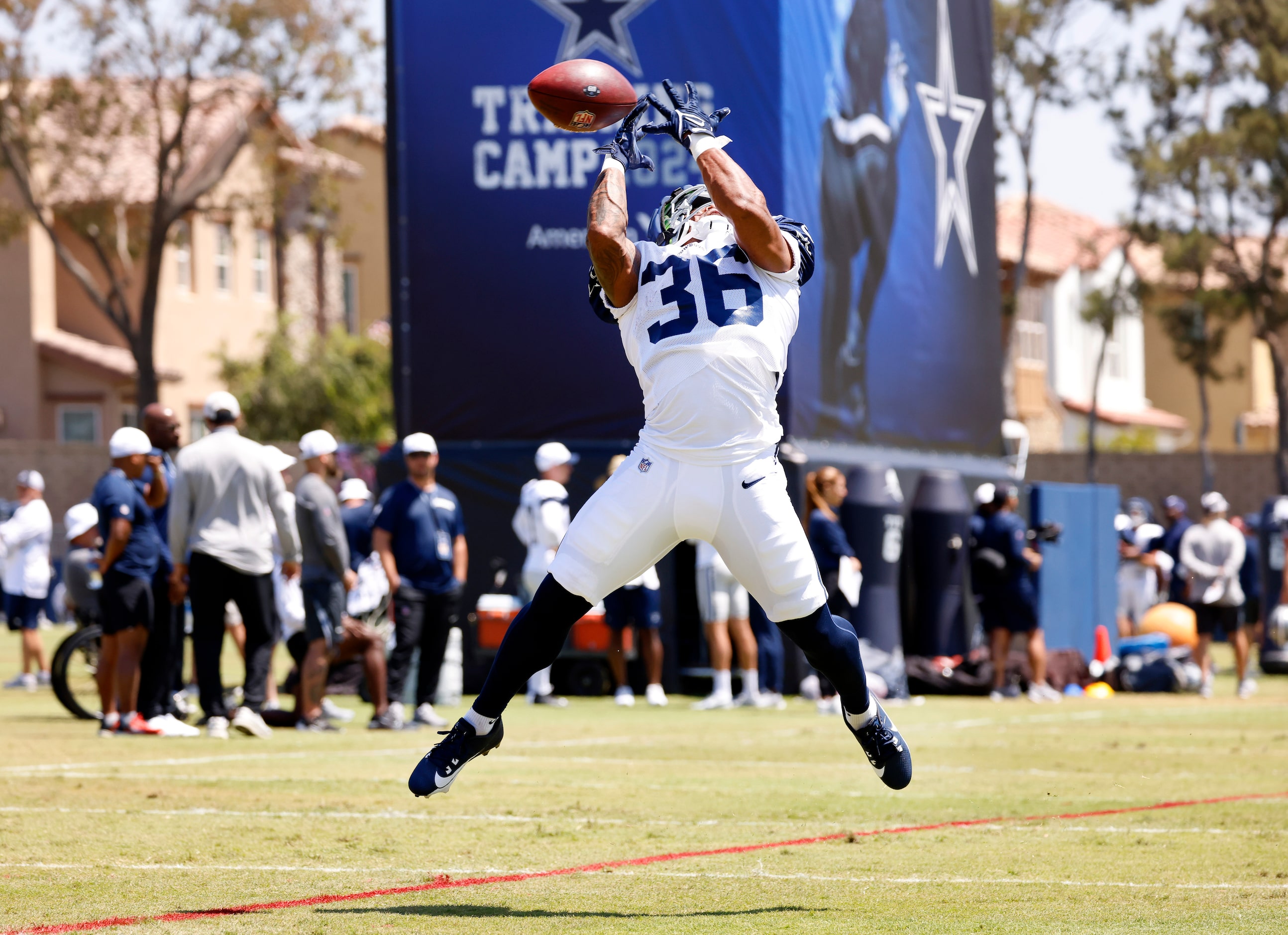 Dallas Cowboys running back Nathaniel Peat (36) attempts a catch a deep route pass during...