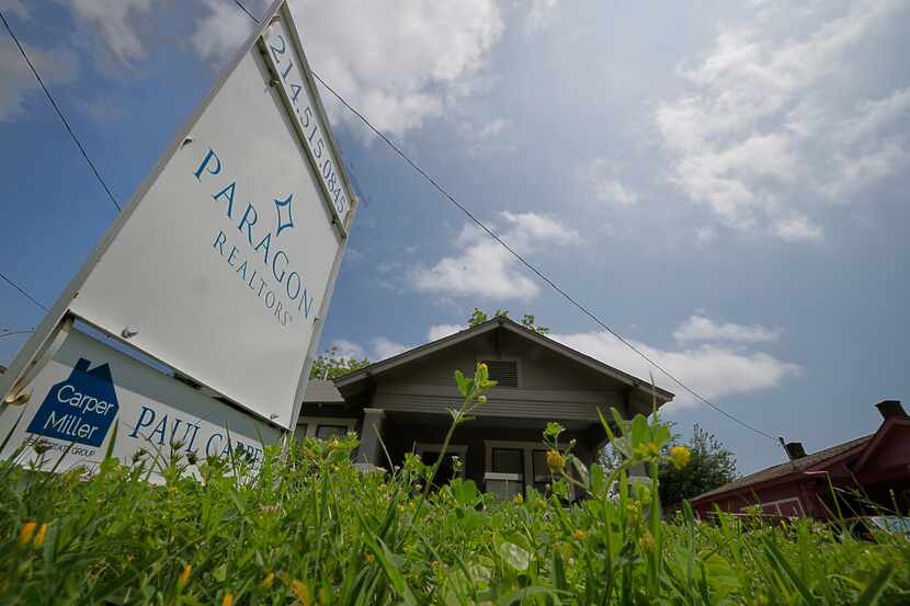 A sales sign is seen in front of a house at 2826 Tanner St., Tuesday, April 30, 2024, in...