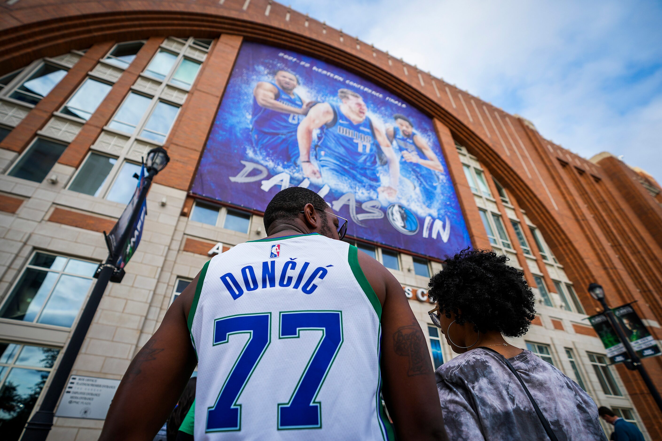 Dallas Mavericks fans wait to enter the arena before Game 3 of the NBA Western Conference...